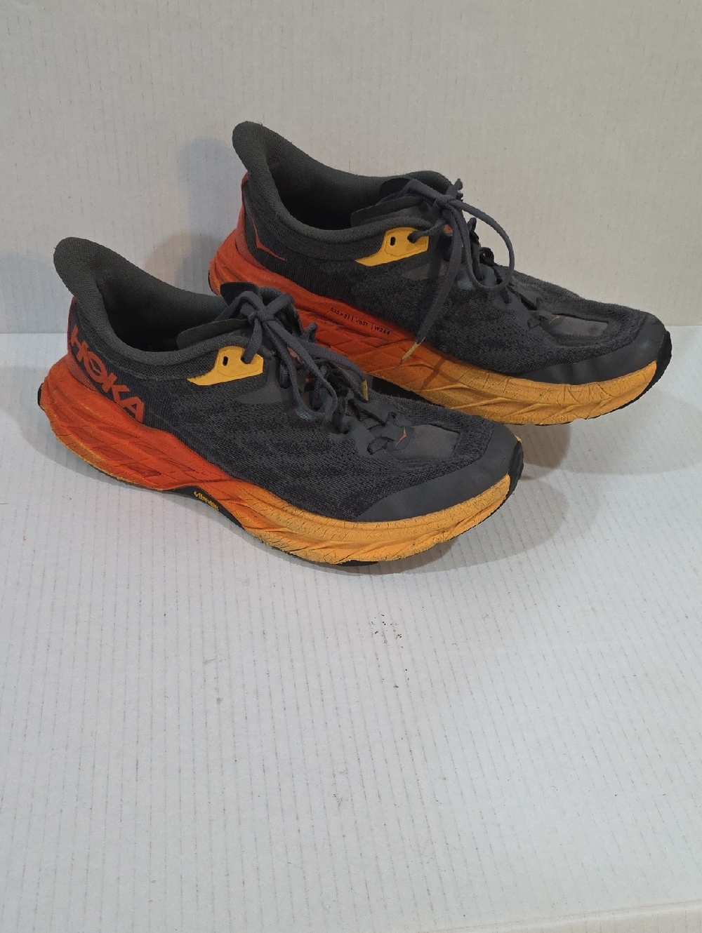 Hoka SpeedGoat 5 Men's Dark Gray Running Shoes with Orange and Yellow Size 10.5